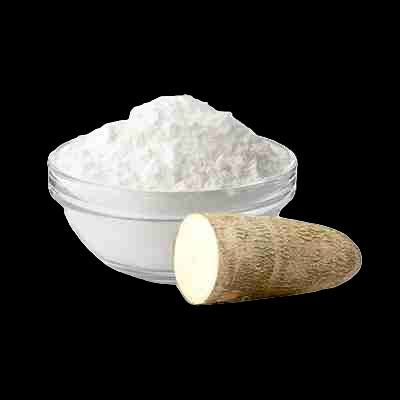 Glass bowl with Tapioca Starch powder and a root piece on a white background