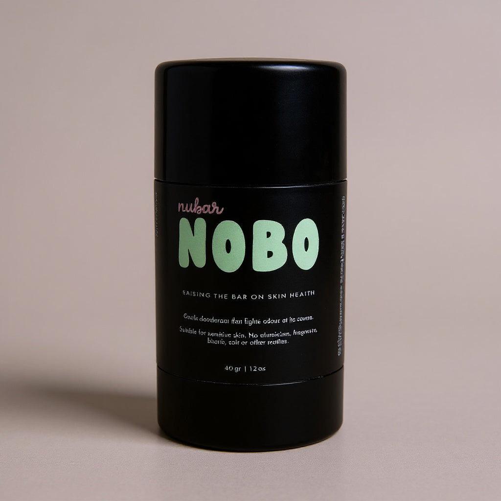 Black deodorant stick with 'nubar NOBO' branding on a beige background