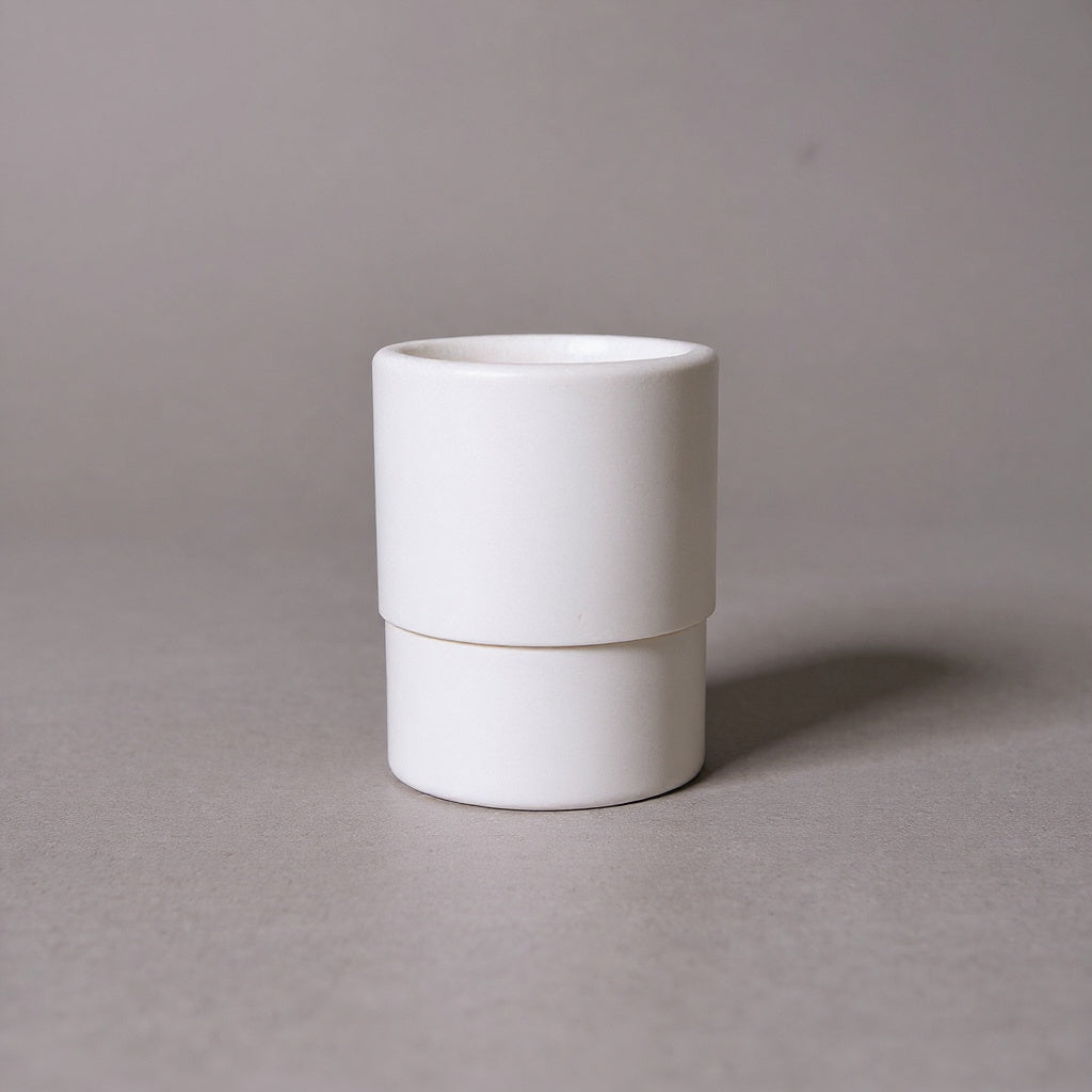White refill canister made of cardboard to be added to the NOBO solid deodorant tube.